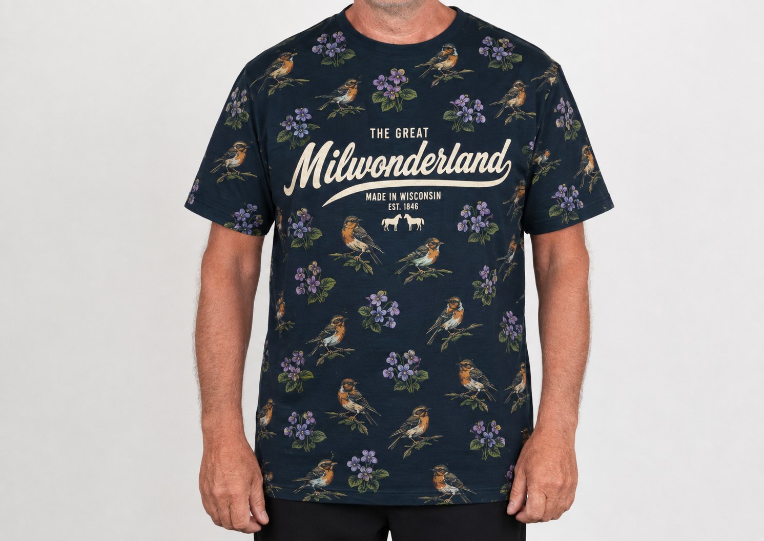 Navy Milwonderland tee patterned with robins and wood violets