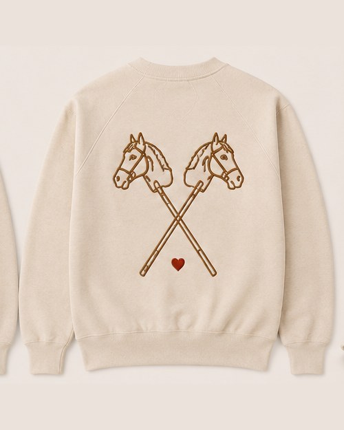 The bone crewneck laid flat, back.